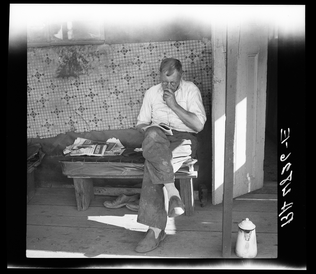 A part-time fruit worker in his squatter's shack under the Ross Island Bridge. Portland, Oregon