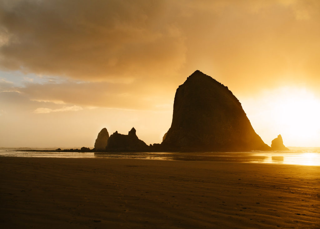 Cannon Beach Oregon Haystack Rock, best oregon towns, spring road trip, best towns to visit, 2024