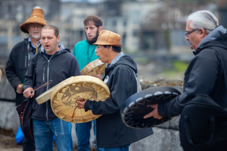 member of the grande ronde tribe play ceremonial drums at willamette falls oregon