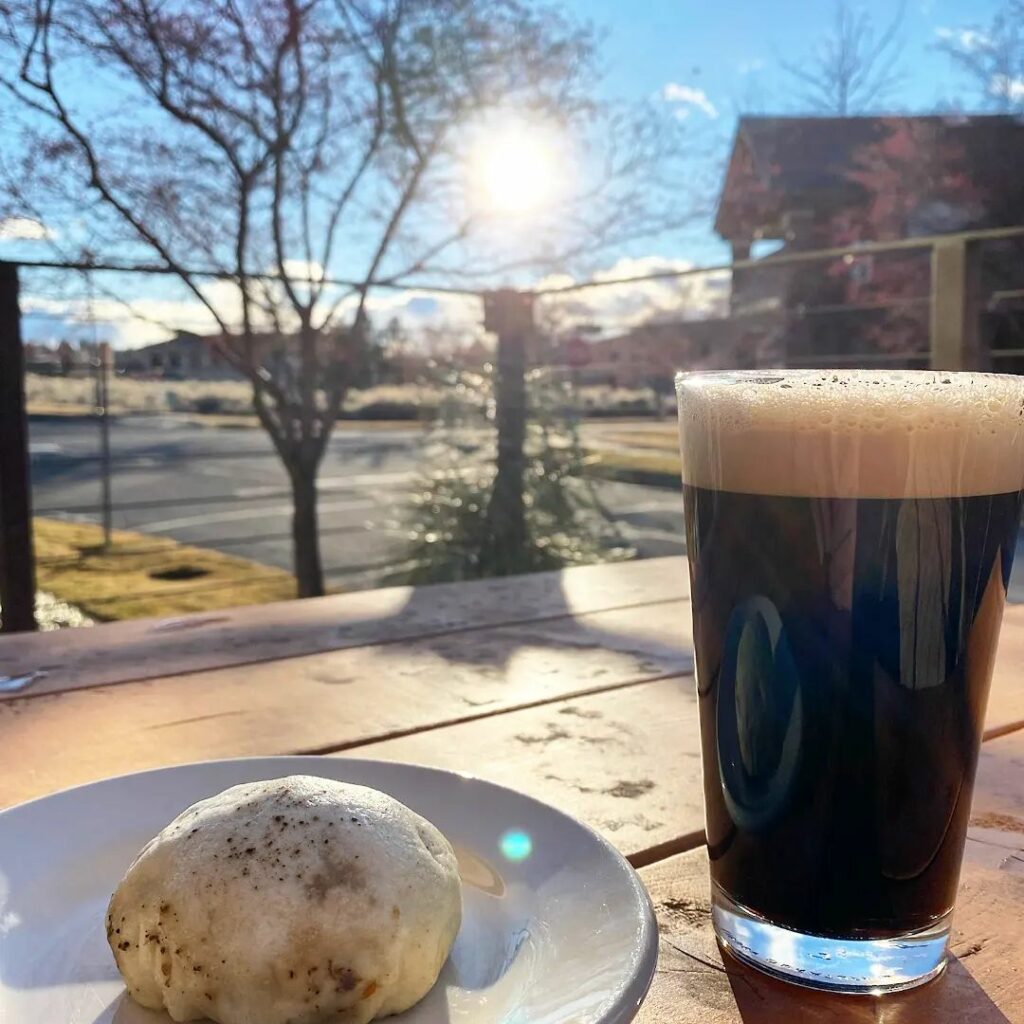 Dumplings and a drink outside of Dump City Dumplings