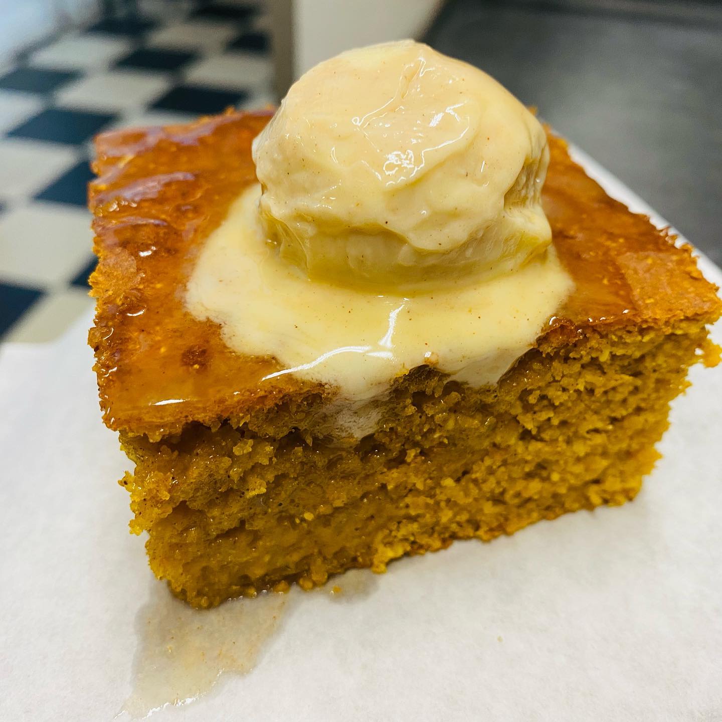 Seasonal pumpkin cornbread with a dollop of melting butter at the Cornbread Cafe