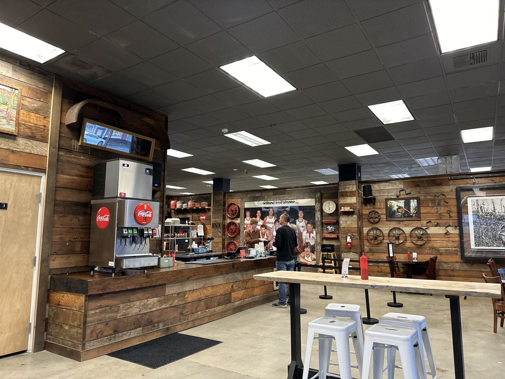 The interior of Sandy-O's. There is wood paneling on the walls.