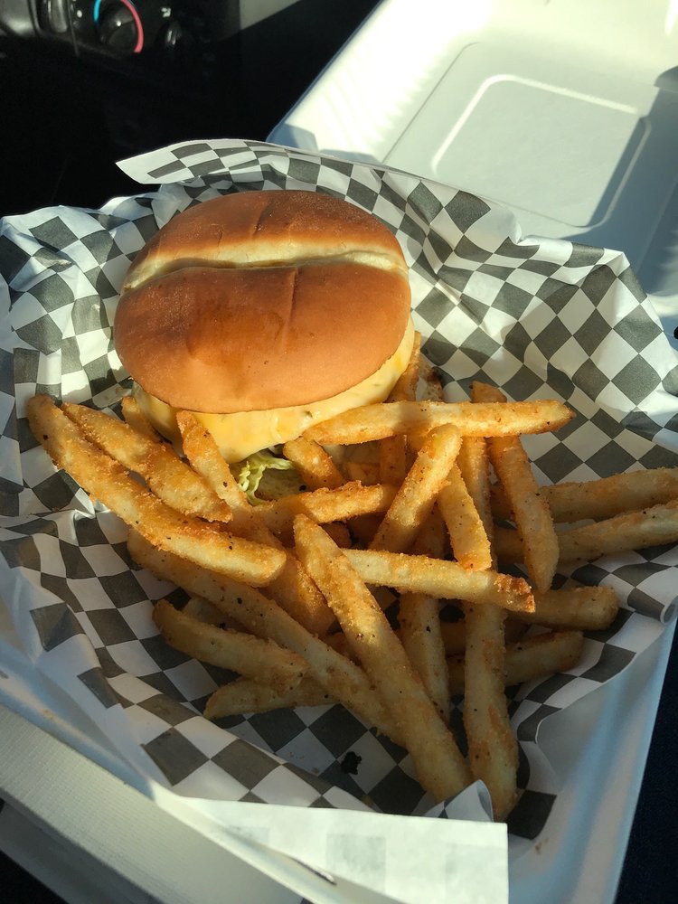 Kraken Burger with an elk patty and a side of fries.