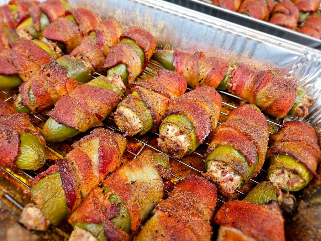 Bacon wrapped stuffed fried jalapenos.