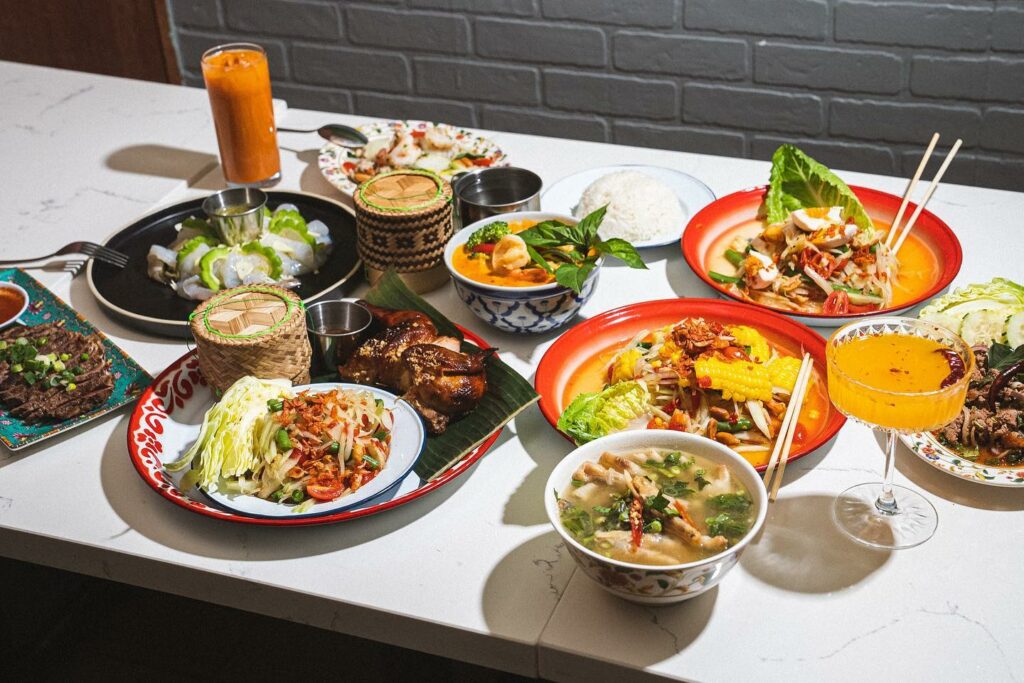 An array of colorful and delicious looking Thai food dishes.
portland oregon, best restaurants, 2024, where to eat, best brunch, food and drink, bars, pizza, sushi, thai food, PDX, foodie heaven