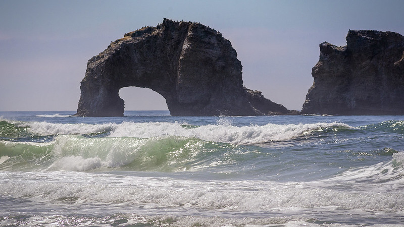 Twin Rocks.  It's a huge arched rock in the ocean surf.